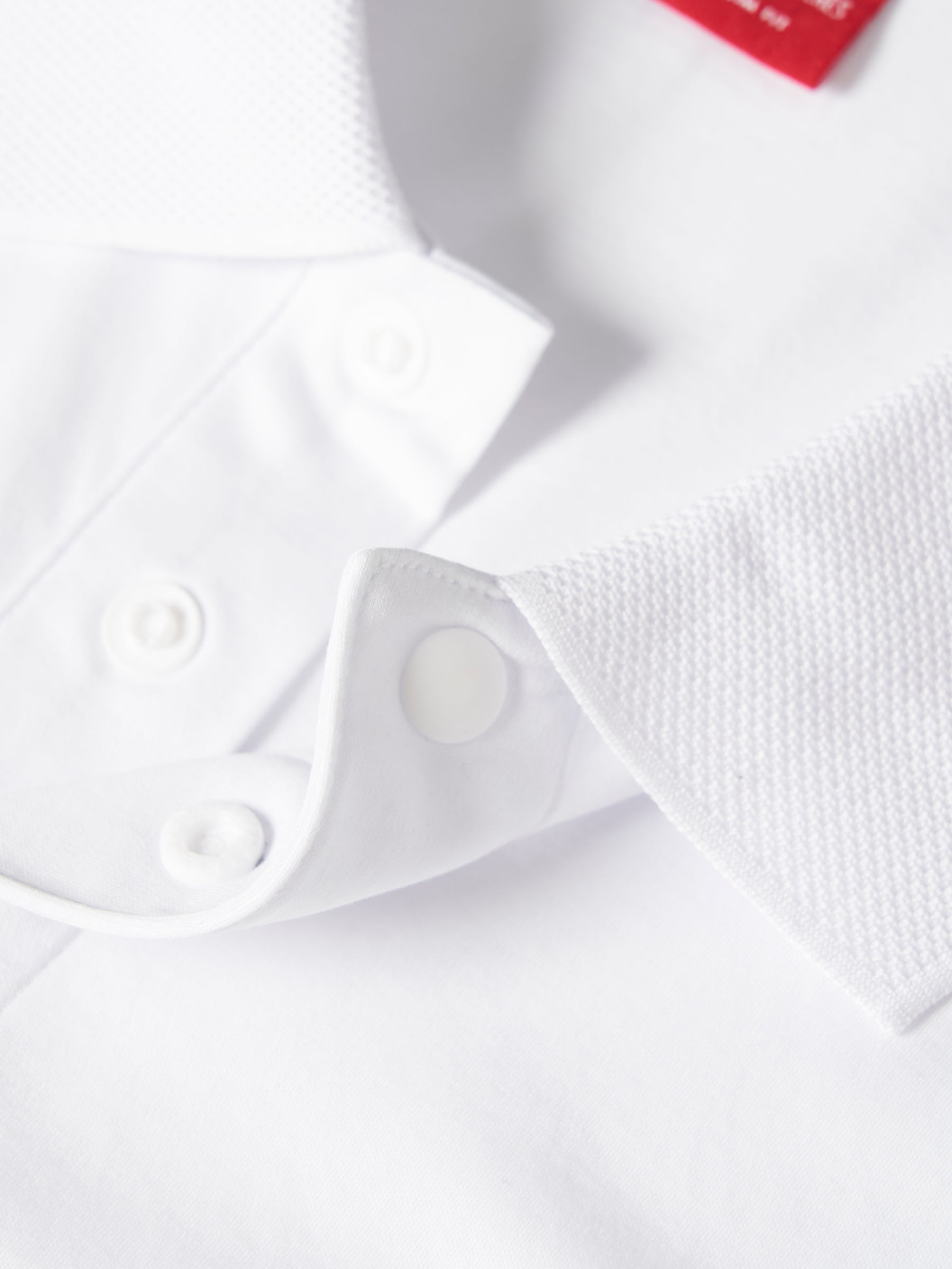 Polo slim fit de algodão com molas