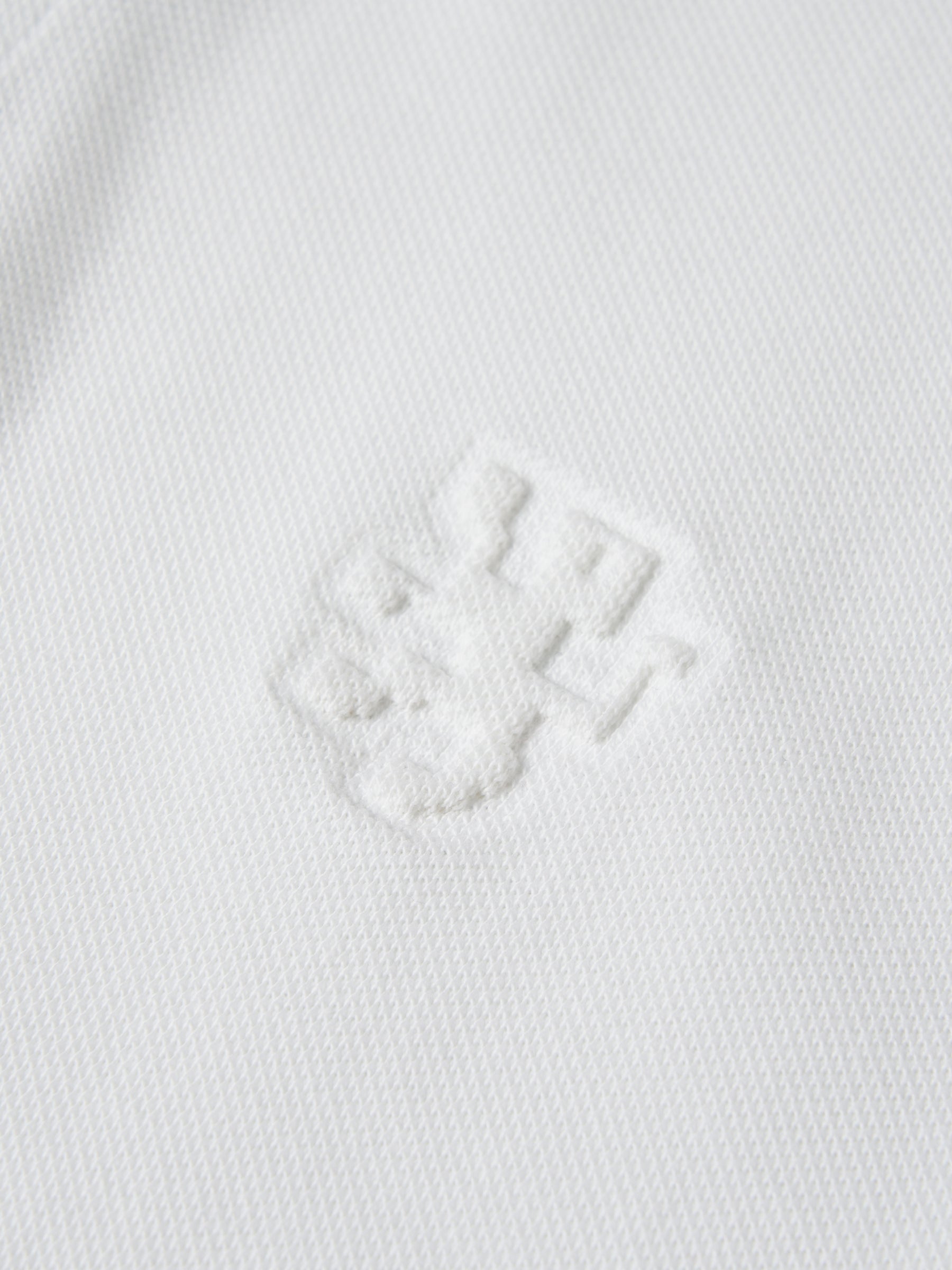Polo piqué slim fit com riscas