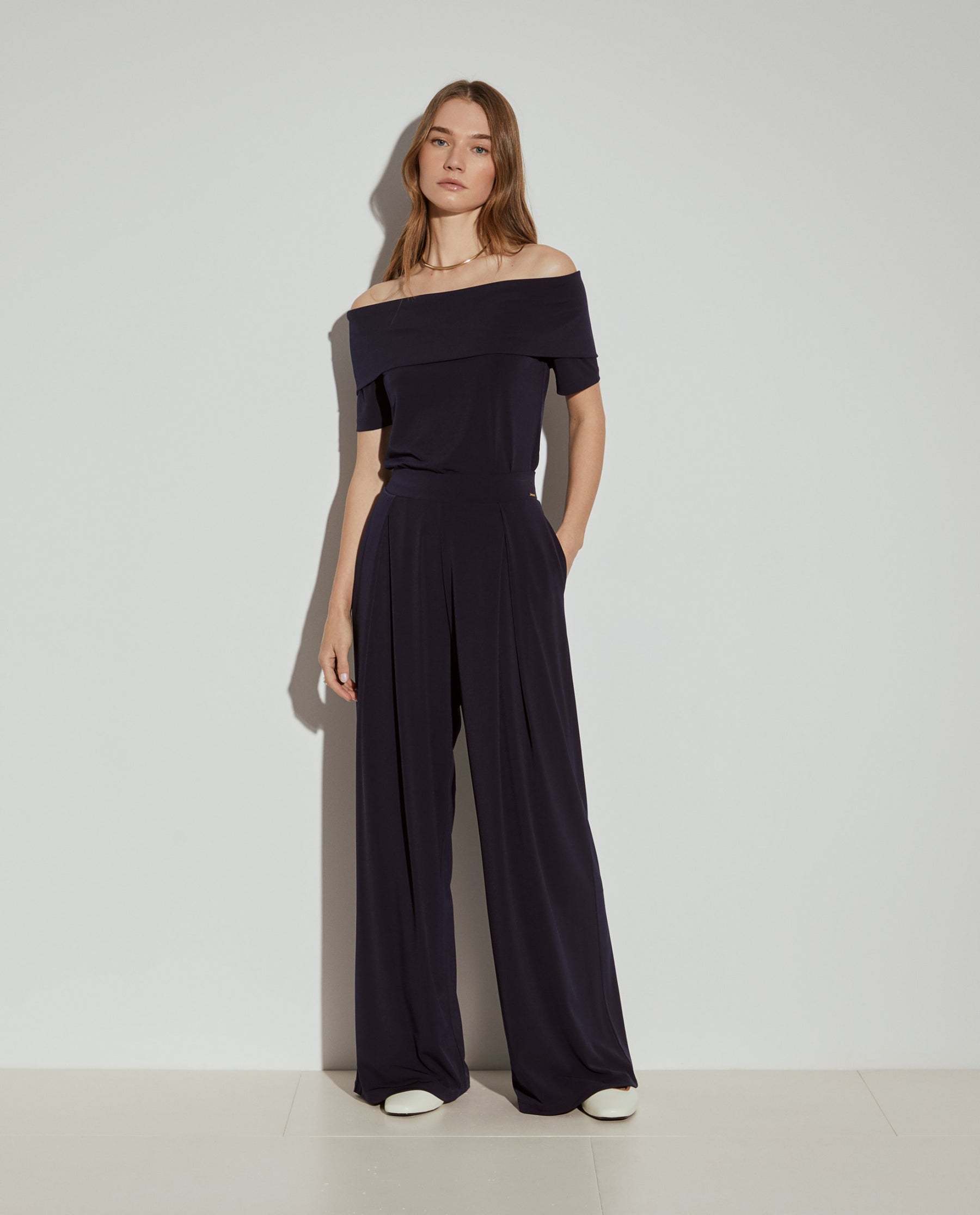 Calças fluidas wide leg