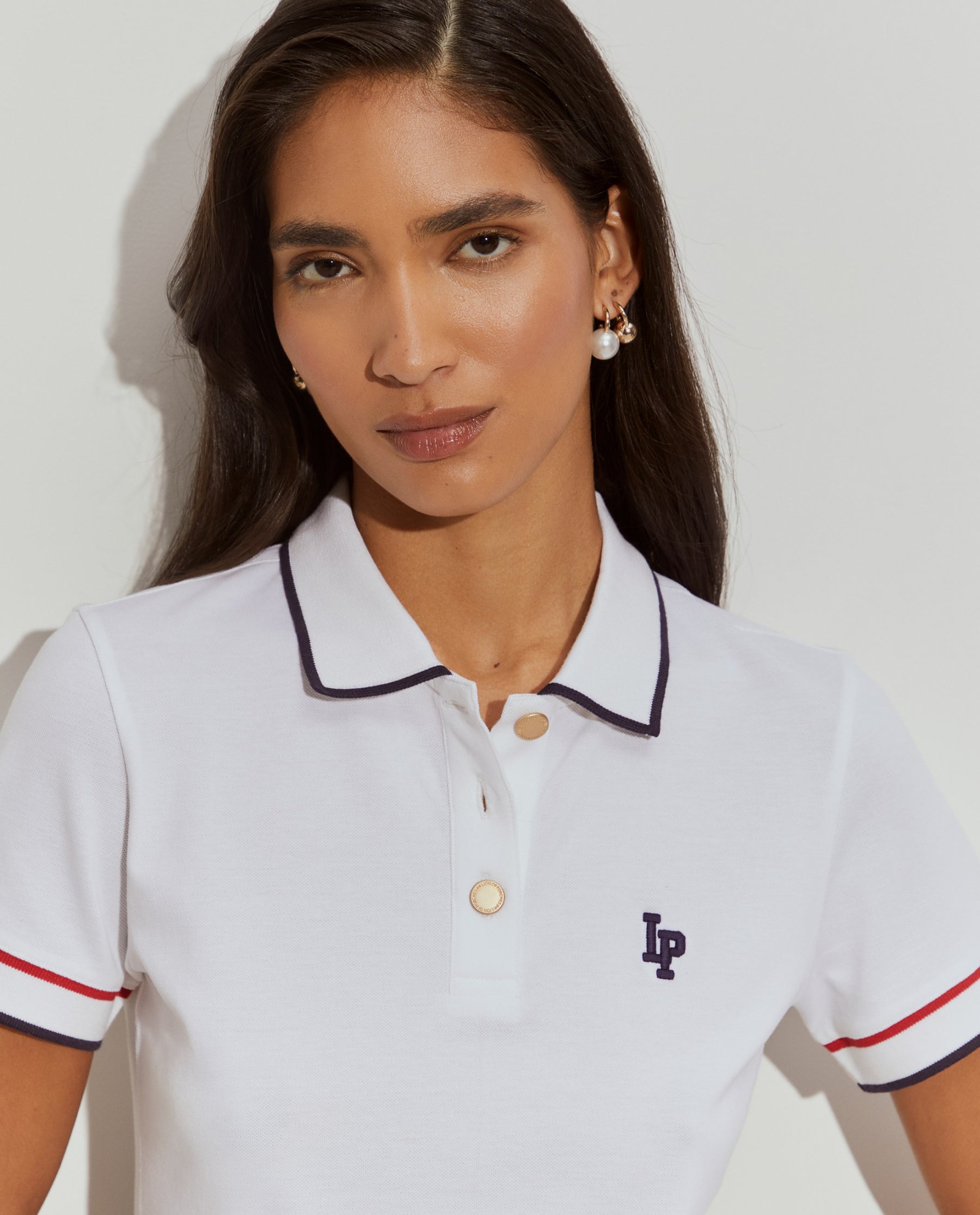 Polo de algodão com riscas