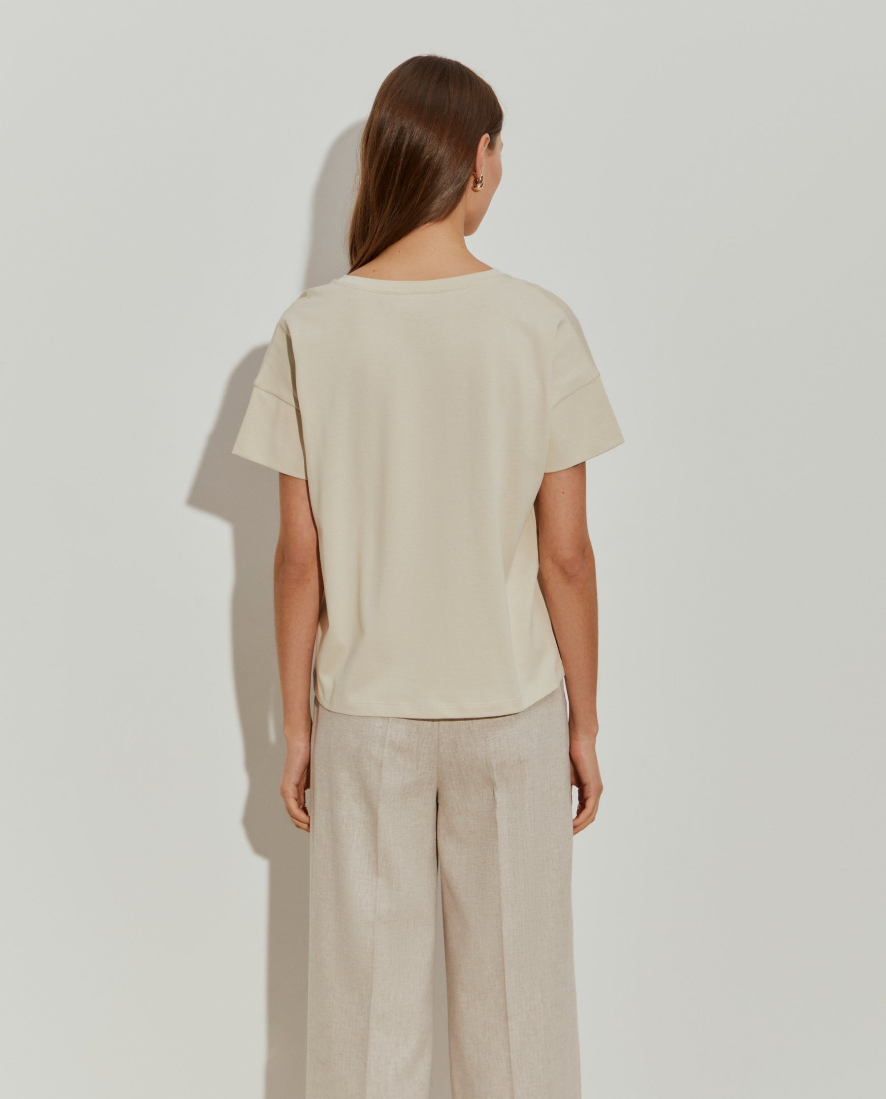 T-shirt de algodão com flor bordada