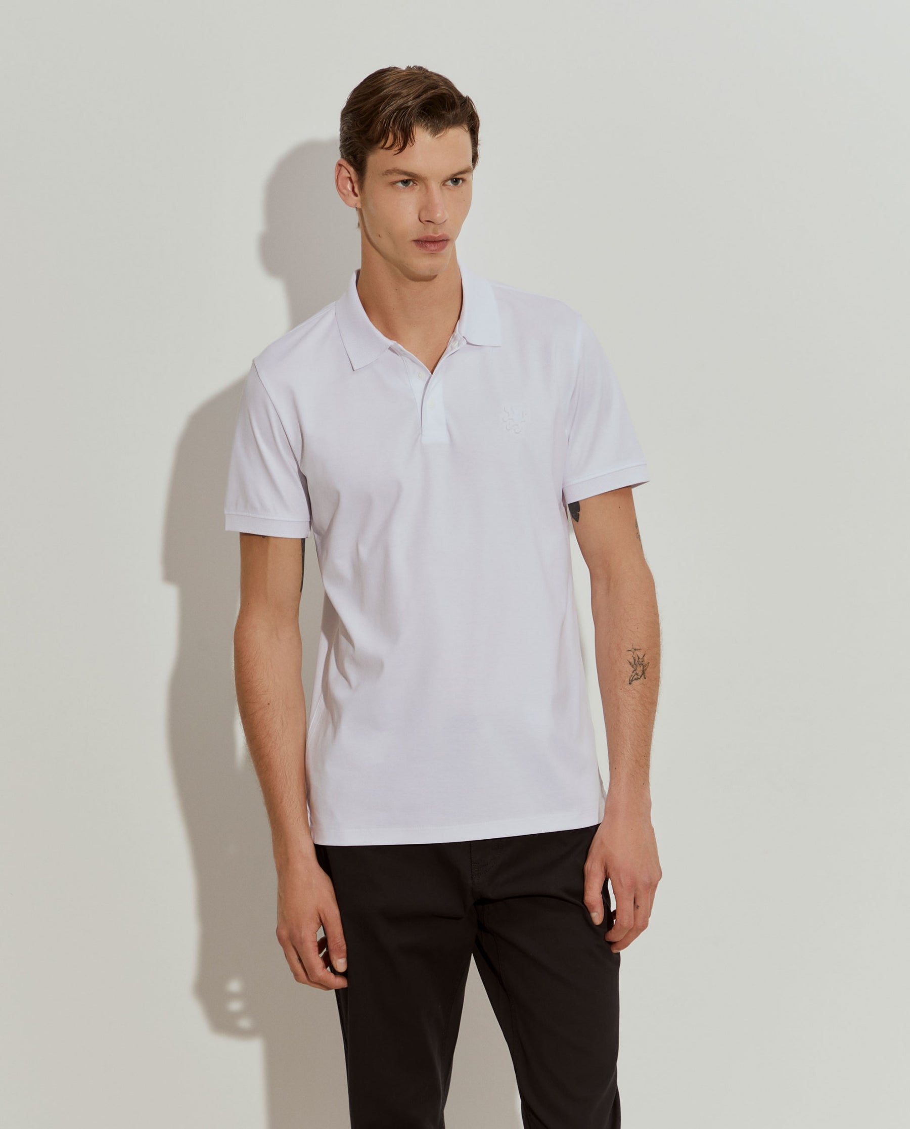 Polo slim fit de algodão com molas