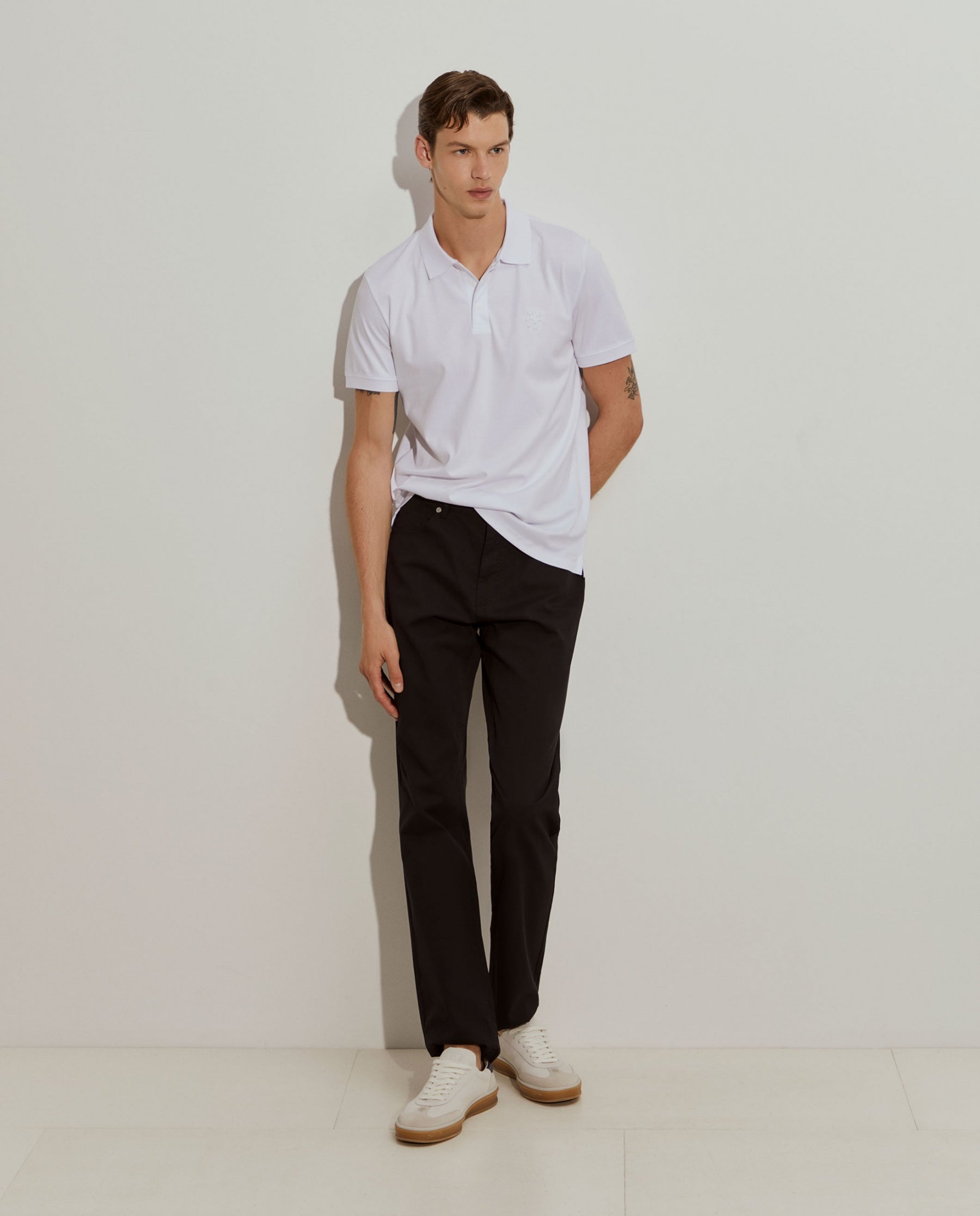 Polo slim fit de algodão com molas