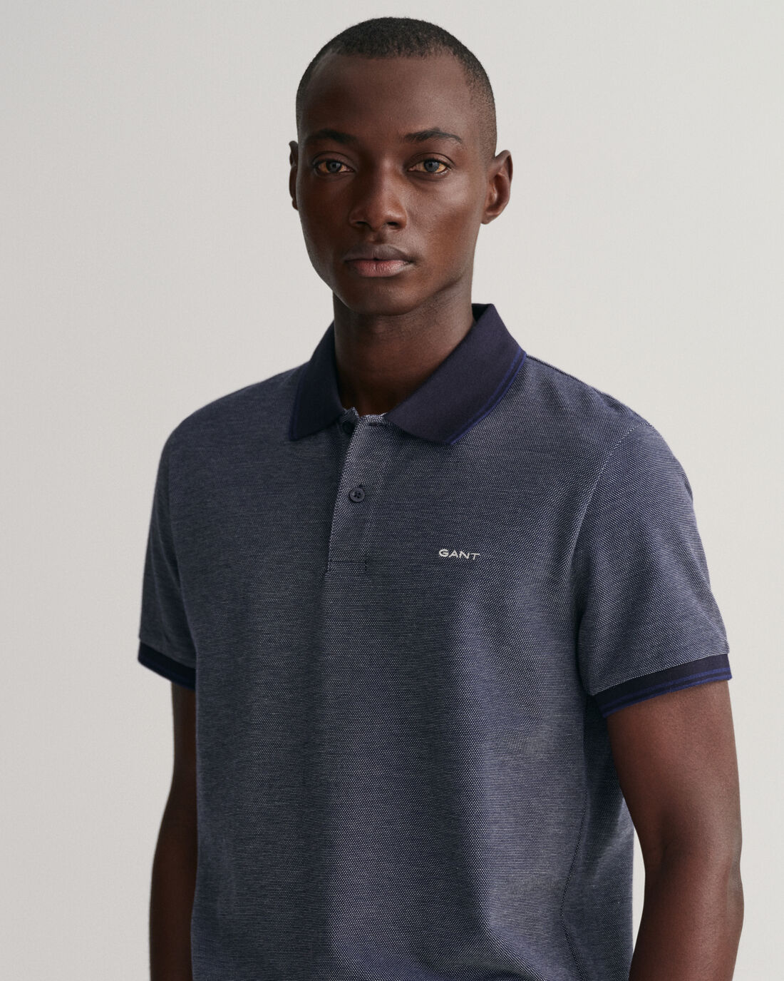 Polo em piqué Oxford em 4 cores