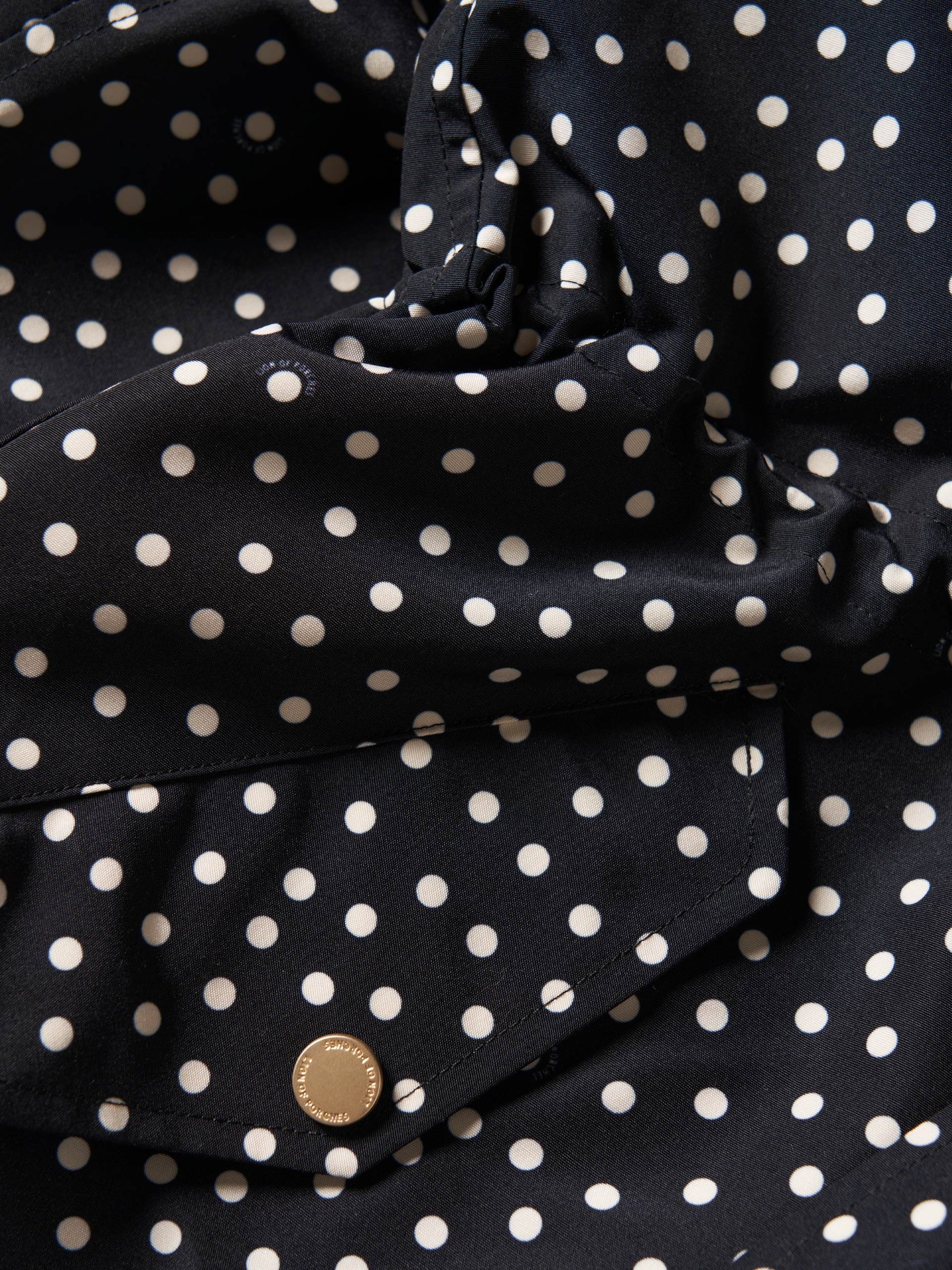 Parka comprida polka dots com capuz