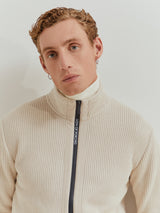 Casaco malha canelada gola alta