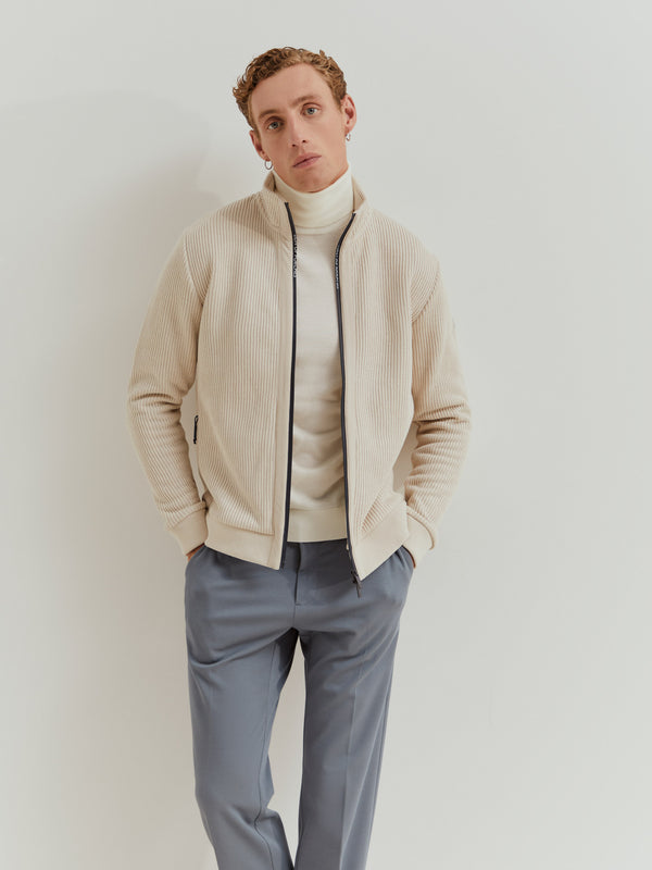 Casaco malha canelada gola alta