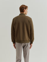 Casaco em tecido técnico com frente acolchoada