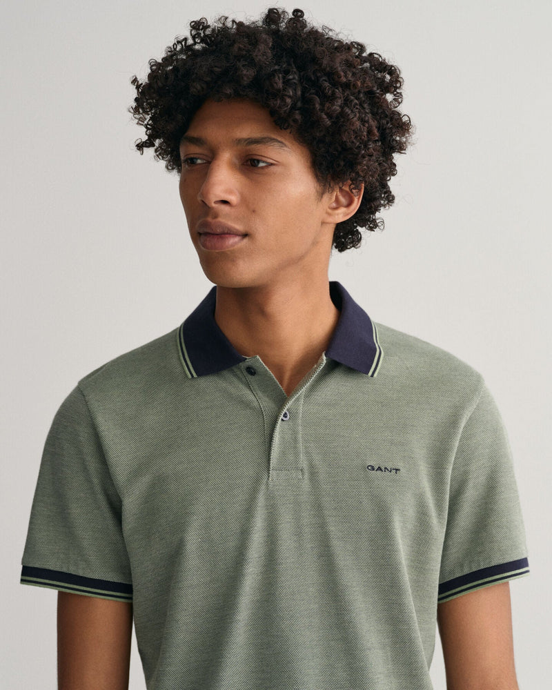 Polo em piqué Oxford em 4 cores