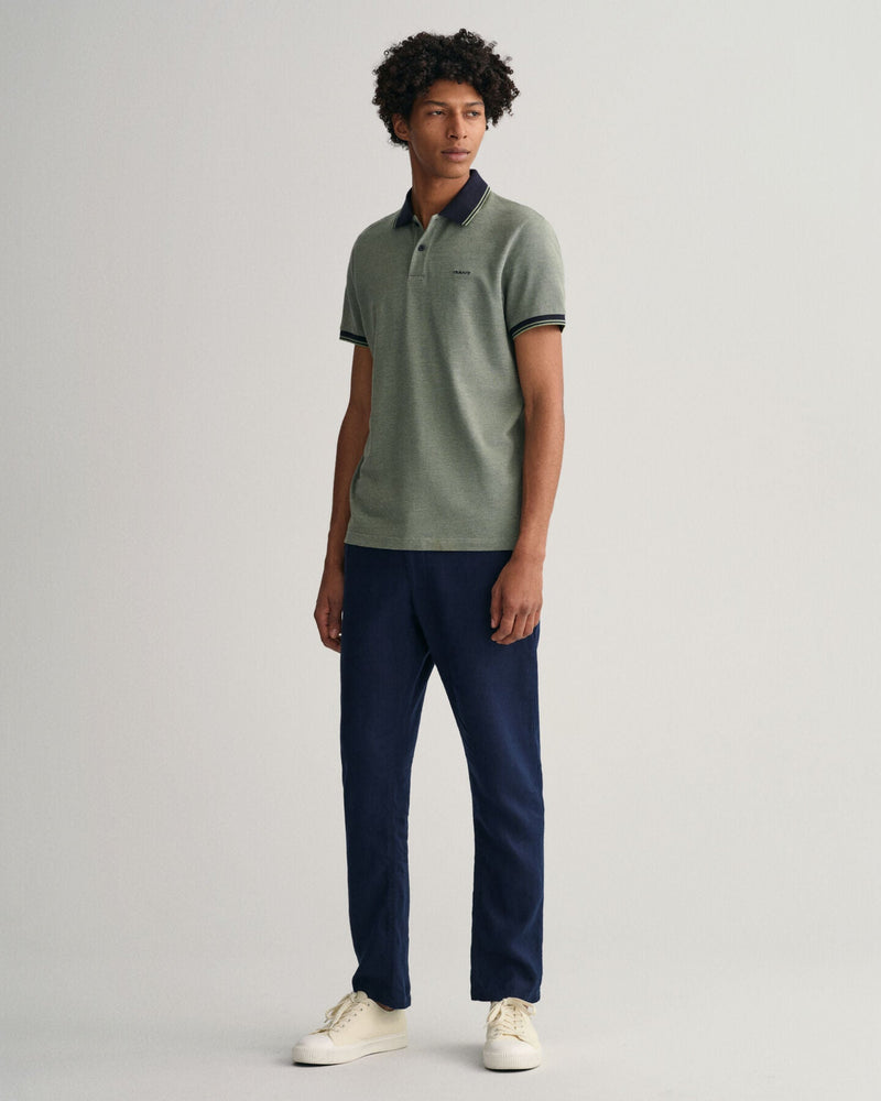 Polo em piqué Oxford em 4 cores