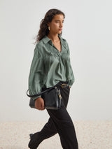 Blusa com bordado de manga comprida