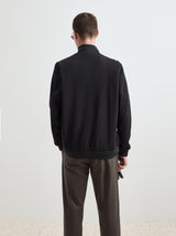 Blusão acolchoado com mangas de malha