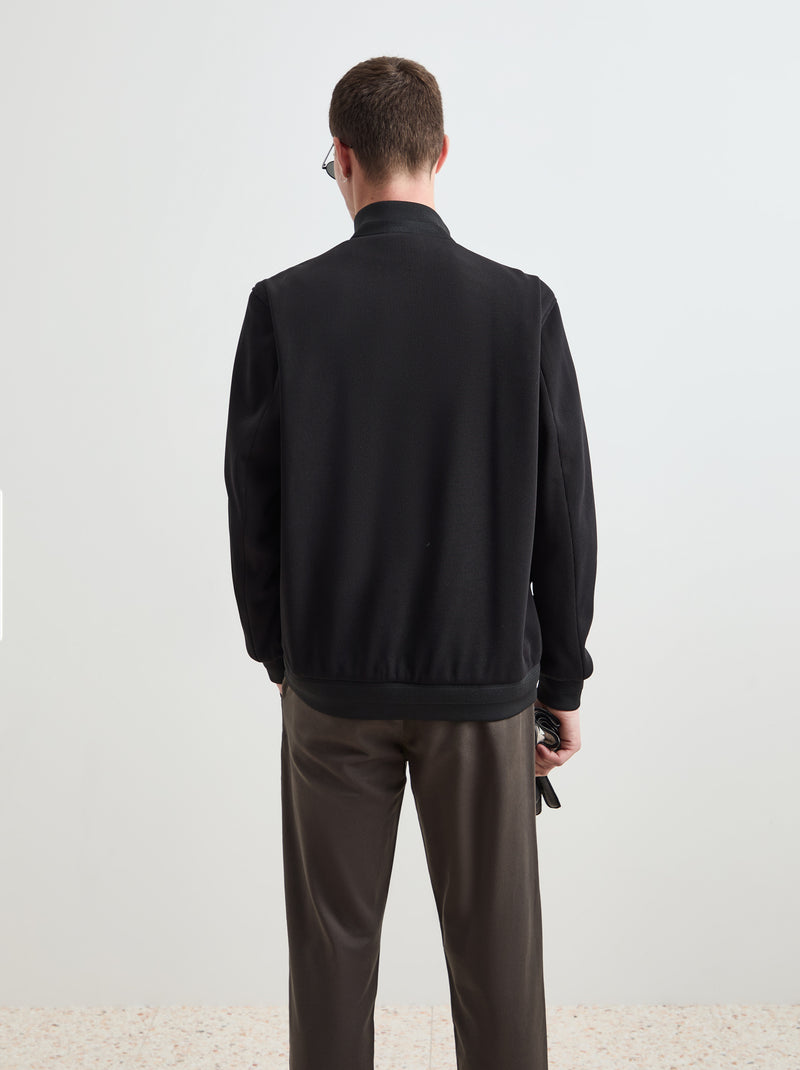 Blusão acolchoado com mangas de malha