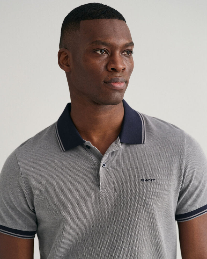 Polo em piqué Oxford em 4 cores